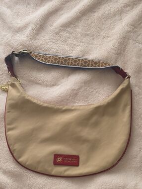 Kipling Beige Hobo Shoulder Bag with Red Trim and Patterned Strap